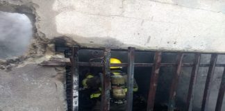 Mueren hermanitas en incendio; padres las dejaron bajo llave y calentón prendido