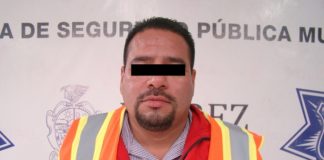 Arrestan a tipo armado que cuidaba negocio de mariscos