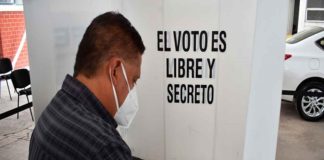 Si tengo covid-19 ¿puedo ir a votar?