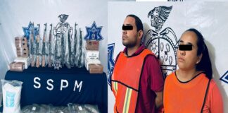Acusan a pareja de poseer un arsenal impresionante