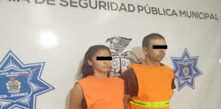 Dos personas en posesión de vehículo con reporte de robo y cristal