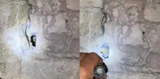 Captan inquietante ojo observando desde un agujero en la pared de una casa